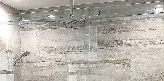 Frameless sliding shower door installation